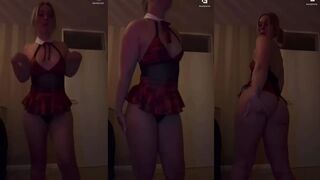 Booty Luna: Twerkend met een rood geruit uniform dat niets verbergt